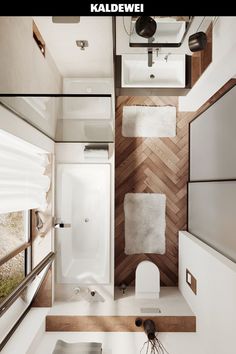 the interior of a small bathroom with wood flooring