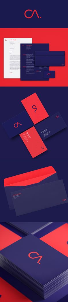 some red and blue business cards on top of each other with the letter c in the middle