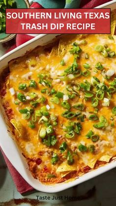 southern living texas trash dip recipe in a casserole dish with green onions and scallions