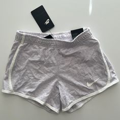 Girls Size Medium Light Purple Color With White Trim Brand New With Tags Spring Workout Cotton Shorts, Spring Cotton Workout Shorts, Nike Athletic Shorts For Summer Loungewear, Nike Shorts For Summer Loungewear, Summer Cotton Athletic Shorts For Workout, Soft Nike Shorts, Nike Casual Stretch Shorts, Casual Stretch Nike Shorts, Nike Cotton Shorts For Summer