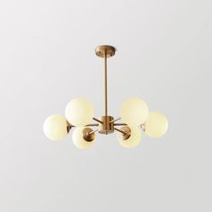 Karrington Chandeliers - Metavaya Chandelier Bedroom, Globe Chandelier, Candelabra Bulbs, Shortening, Large Table, Brass Chandelier, The Ceiling, Types Of Lighting, Transitional Design