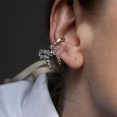 This thick cuff is easy to pair with any earrings in your lower lobe. The faceted surface of the cuff and clear zircon beads bow plays nicely in the light. Handcrafted in a thick sterling silver that gives a pure, minimalistic but bold look. Unlike cuffs made with wires, this ear cuff will not bend out of shape after multiple use. Cuff are sold individually. diameter: 15 mm inner diameter: 9.5 mm cut about 5 mm weight: about 1.8 gram bow charm part: sterling silver attachment 5x6 mm bow made of clear zircon beads 3 mm  weight with charm: ~2 gram It would be a perfect cute gift for someone you love or to treat yourself) The cuff  will come in a small bag with an attached card and a cloth for cleaning silver. Please contact me if you have any questions) Beaded Bow, Piercing Fake, How To Clean Silver, Wrap Earrings, Fake Piercing, Silver Ear Cuff, Bow Jewelry, Ear Cuffs, Cuff Earrings