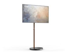 a large screen on a metal stand with a white background