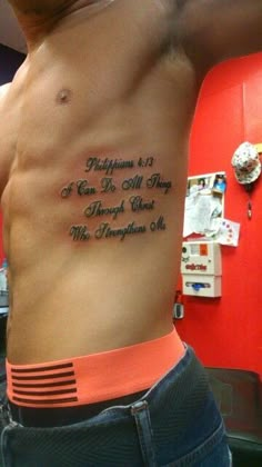 Side Tattoos For Men Ribs Quotes, Philipians4:13 Tattoo Men, Tattoos On Ribs Men, Rib Writing Tattoo Men, Ribs Quote Tattoo, Rib Men Tattoo, Bible Verse On Ribs Tattoo, Bible Verse Stomach Tattoo, Men’s Rib Tattoo Ideas