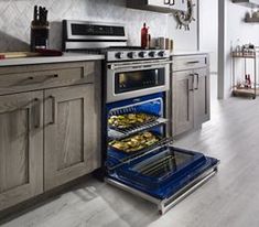 an oven with the door open in a kitchen