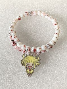 ❣️ Please check out my shop page for current shipping times, shop updates, and coupon codes! ❣️ Go beyond PLUS ULTRA! This adorable silver plated memory wire wrap bracelet is a great addition to any My Hero Academia fans' outfit! Memory wire is awesome because it will always retain its shape. It's made to fit a larger size wrist. The glass beads have a blood splattered pattern on them, but no worries, it's not real blood! The silver plated Toga charm is approximately the size of a quarter, and the second photo shows the size comparison. If you have any questions, please do not hesitate to ask! Please read my policies section before purchasing. Thank you so much for looking, and have a wonderful day! ⚜️ FREE GIFT WITH EVERY PURCHASE! THE MORE YOU BUY, THE MORE YOU GET! ⚜️ *NOTE: Due to ligh Go Beyond Plus Ultra, Memory Wire Wrap Bracelets, Wire Wrap Bracelet, Plus Ultra, Size Comparison, Memory Wire, Wire Wrap, Hero Academia, Free Gift