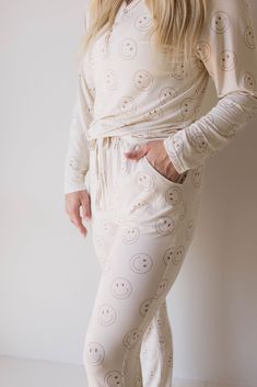 Our favorite pajamas are now available for women too! These pajamas feature snaps down the front for easy accessibility for breastfeeding moms and elastic waistbands ensure max comfortability. Material : 95% bamboo viscose / 5% spandex Upgrade your lounge wear with the Just Smile Ivory | Bamboo Women's Pajamas. Crafted from breathable bamboo, they keep you both cool and comfortable during those leisurely days and nights. Plus, their ivory color adds a touch of luxury to your relaxation. Sizes Av Pajamas Matching, Baby Luna, Diaper Bag Accessories, French Baby, Bamboo Pajamas, Women's Pajamas, Sleepwear Sets, Just Smile, Girls Pajamas