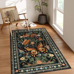 a butterfly rug is on the floor in front of a chair and potted plant