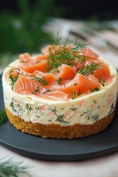 there is a small cake with salmon on it