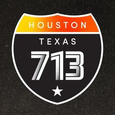 the logo for houston texas 733 is shown in black and white with an orange stripe