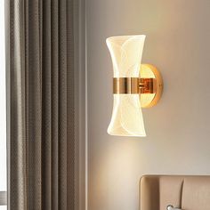 Description 
 
 
 
 Voltage 
 110V-120V,220V-240V 
 
 
 Color 
 Gold 
 
 
 Number of Lights 
 1 
 
 
 Style 
 Nordic 
 
 
 Material 
 Iron 
 
 
 Lamp Shade Material 
 Acrylic 
 
 
 Fixture Type 
 Wall Lamp 
 
 
 Occasion 
 Living room, bedroom 
 
 
 Bulb Type 
 Built-in LED 
 
 
 Wattage 
 10W 
 
 
 Lumen 
 1000lm 
 
 
 Integrated LED 
 Yes 
 
 
 
 
 
 
 
 
 Dimensions 
 
 
 Style 
 A 
 B 
 
 
 Fixture Width 
 2.95"/7.5cm 
 3.35"/8.5cm 
 
 
 Fixture Height 
 9.06"/23cm 
 9.06"/23cm 
 
 
 Ceiling Gold Sconces, Bedroom Decor Lights, Led Wand, Decor Lights, Bedroom Bedside Lamp, Living Room Balcony, Wall Lamps Bedroom, Creative Lighting, Contemporary Luxury