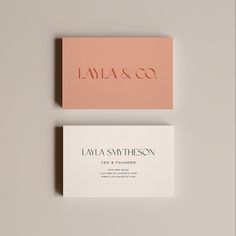 two business cards on top of each other with the word lava & co in red