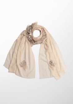 This stunning beige scarf is woven from a very fine cashmere. The uniqueness of this scarf is a stunning collar made from a combination of a tonal beige satin leaves and feathers making it a must-have Maneesha Ruia signature creation that will make heads turn whilst keeping you fashionably warm on any evening out. Luxury Beige Scarf For Fall, Elegant Beige Wool Scarf, Elegant Beige Shawl For Spring, Beige Pashmina Scarves For Winter, Elegant Cashmere Shawl Scarf, Elegant Cream Shawl Scarf, Chic Beige Shawl For Spring, Elegant Silk Scarves For Winter, Elegant Silk Winter Scarves