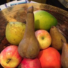 a bowl filled with different types of fruit