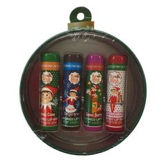 three christmas themed lip bales in a round container