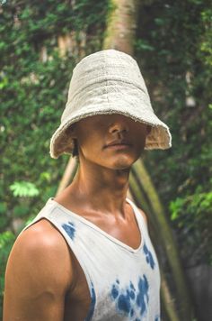 A sturdy, soft, and light hat designed with the brim to be worn flipped up when you want to see people, and flipped down when you'd like a bit more privacy. Inspired by the Japanese Komūso monks, or 'the monks of emptiness' the Monk Bucket Hat is to be worn to help remind us of our ability for selflessness, and that our bodies are only a vessel. 100% handwoven undyed organic cotton GOTS certified organic cotton sewing thread Cut and sewn with care in Bali This piece is made to order and will be Head Challenge, The Monks, Hats For Sale, Sewing Thread, Our Body, Hat Sizes, Hat Designs, Vintage Photos, Bucket Hat