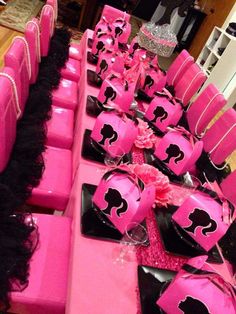 pink and black table setting for a bachelor party