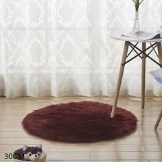 Descrption: Product Name: Living room furry floor mat Material: Polyester (polyester) Size: Size: Diameter 30cm/11.8in / Diameter 80cm/31.5in Feature: 1. Non-slip design: the surface is fine and soft and comfortable, and the back is suede interlined with non-slip softness, so there is no need for children or pets to fall down while playing on the luxurious furry area carpet. Before placing a thick, comfortable and chic carpet on the floor, always keep the bottom dry and clean 2. Wide range of ap Shag Rug Living Room, White Faux Fur Rug, Nordic Rug, Bedside Rugs, Nordic Living Room, Faux Fur Rug, Fur Rug, Solid Color Rug, Plush Carpet