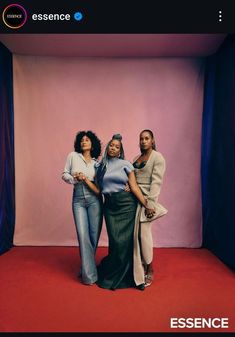 three women standing in front of a pink backdrop with the words essence on it