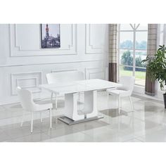 a white table and chairs in a room