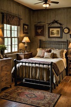 a bed room with a neatly made bed and two lamps