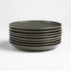 stack of black plates on white background