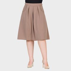 This perfect spring and summer skirt features large pleats at the waist, creating a flattering flared silhouette. With a wide elastic waistband and convenient side pockets, this knee-length plus-size skirt is both stylish and functional. Easily transition from casual to dressy with the right accessories. Crafted from a breathable, stretchy polyester-spandex blend, it’s ideal for staying comfortable in warmer weather. Midi Denim, Denim Jeggings, Denim Midi Skirt, Ladies Of London, Plus Size Skirts, Hem Style, Summer Skirts, Bottom Clothes, Skirts With Pockets