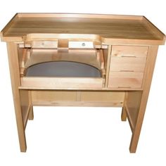 a wooden desk with drawers and an open drawer on the bottom shelf that has a cushion in it