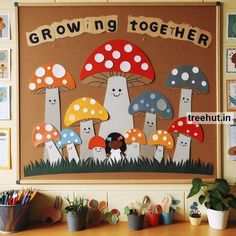 a group of mushrooms sitting on top of a wooden table in front of a bulletin board