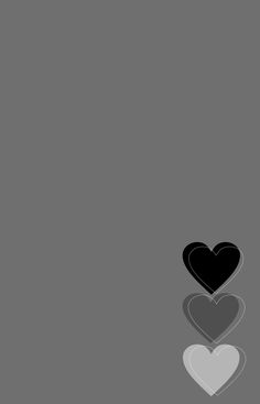 two hearts on a gray background with one black and one white heart in the middle