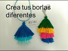 two colorful tassels hanging from a blue cord with the words crea tus borias differentes