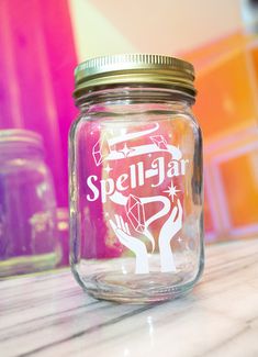 a glass jar sitting on top of a counter