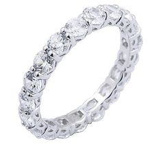 The look of luxury. A sparkling parade of round, prong-set cubic zirconia Diamonique(R) simulated diamonds renders this glistening eternity band an instant classic in your collection.  Platinum Clad(R) sterling silver is polished sterling silver plated with platinum to create a timeless look at a fraction of the cost of platinum. Diamonique Rings, Diamond Eternity Bands, Eternity Band Ring, Lovely Ring, Diamond Rings Bands, Thumb Rings, Eternity Band Diamond, Diamond Eternity, Ring Size Guide