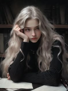 a woman with long blonde hair sitting at a desk in front of books and papers