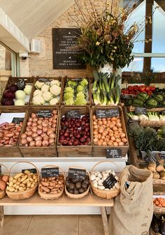 an assortment of vegetables on display at a farmers market