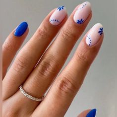 Minimalist nail designs that are perfect for every occasion. From nude tones to dainty accents, these simple nail ideas will elevate your look! #SimpleNailIdeas #MinimalNails #ChicNails Gel Nails Homecoming, Nail Inso Short Almond, White Nails With Blue Accent Nail, Simple Blue And Gold Nails, Blue White Tip Nails, Simple Blue Flower Nails, Cute Gel Nails For Short Nails, Cute Short Acrylic Nails Round, Easy Nail Designs For Beginners Short