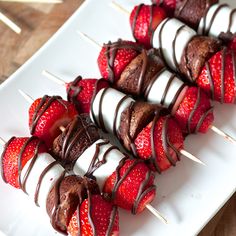 chocolate covered strawberries on skewers with toothpicks