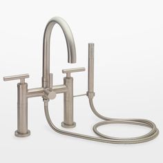 a faucet with two hoses connected to it