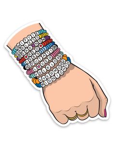 a person's arm with several bracelets on it and one hand holding the wrist