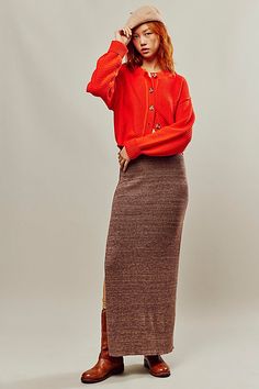 Our top-rated Golden Hour Midi, reimagined as a timeless maxi skirt! Featured in the perfect knit fabrication for a cozy, wear-with-everything feel. **Fit:** Mid-rise, relaxed column silhouette **Features:** Pull-on design, sweater knit fabrication, slit hem feature **Why We ❤ It:** Effortless from season to season, pair this with toughened up moto boots or sporty sneakers for endless ways to wear. | Golden Hour Maxi Skirt by Free People in Brown, Size: L Sweater And Long Skirt Outfit, Knit Midi Skirt Outfit, Knit Skirt Outfit, Long Skirt Outfit, Editorial Poses, Cozy Wear, Midi Skirt Outfit, French Roast, Long Skirt Outfits