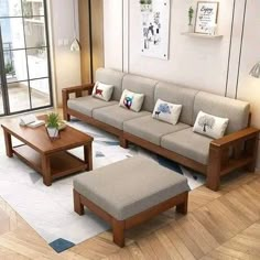 a living room filled with furniture and a wooden coffee table on top of a hard wood floor