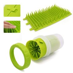 the green brush is being used to clean it's hair and also remove it from its