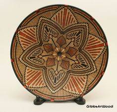 a decorative plate with an intricate design on it