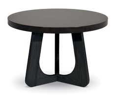 a round wooden table with black legs and an unusual design on the top, against a white background