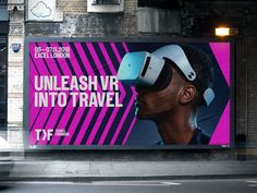 a large advertisement on the side of a building with an image of a man wearing a virtual headset