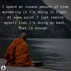 a monk sitting on the edge of a body of water with an inspirational quote above it