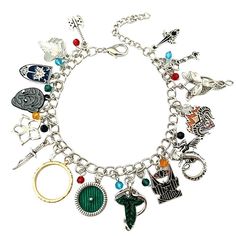 This Lord of the Rings Charm Bracelet is a must-have for any fan of the franchise. The bracelet features intricate enamel work and measures more than 23 cm in size. It is handmade and perfect for cosplay or decorative use. The bracelet is designed with the theme of the movie in mind, featuring the iconic logo and symbols of the franchise. It is a great addition to any collection and makes for a unique and stylish piece of jewelry. Whether you are a fan of the books or the movies, this bracelet is sure to impress. charms are alloy no nickel! will fit up to 9.5” wrist Condition is New. Shipped with USPS First Class Package. No returns We ship daily Lord Of The Rings Jewelry, Gandalf, Handbag Charms, Rings Jewelry, Metal Charm, Photo Bracelet, The Rings, Lord Of The Rings, Chain Pendants