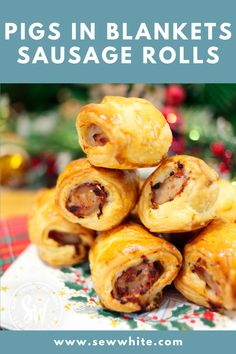 pigs in a blanket sausage rolls on a plate with text overlay that reads pigs in blankets sausage rolls