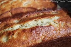 freshly baked bread sitting on top of a cutting board