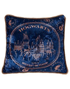 a harry potter pillow with hogwart's castle on it